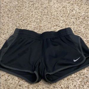 Black and gray nike running shorts